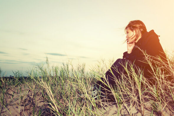 thlsadyounggirlsittingaloneonagrassoutdoorssadnessloneliness3113912 The Holistic Living